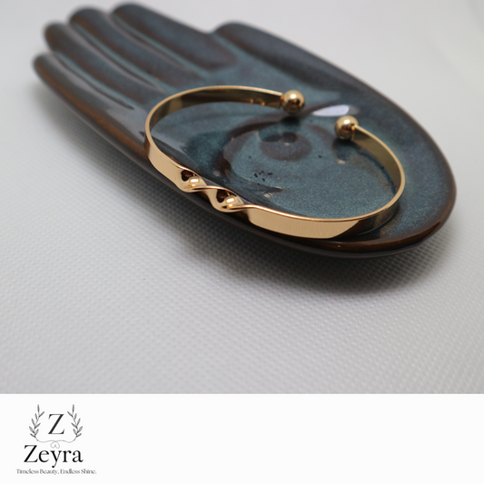 Zeyra Twiste – Moderner Armreif mit Twist-Design in Goldoptik | Zeyra | Versand aus DE