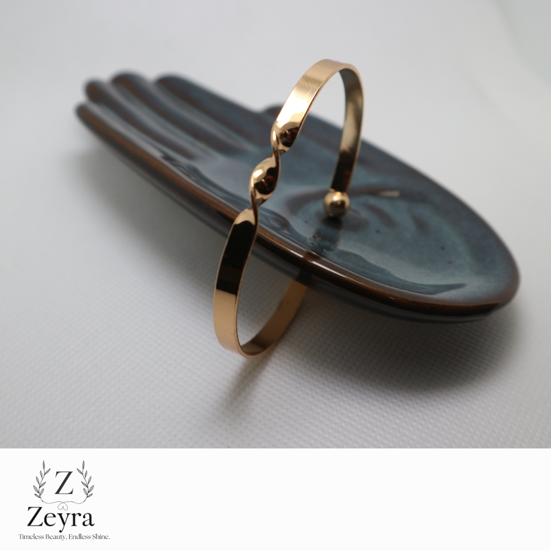Zeyra Twiste – Moderner Armreif mit Twist-Design in Goldoptik | Zeyra | Versand aus DE