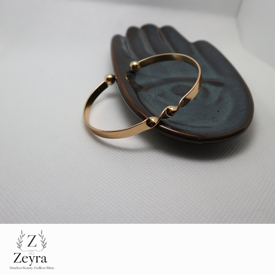 Zeyra Twiste – Moderner Armreif mit Twist-Design in Goldoptik | Zeyra | Versand aus DE