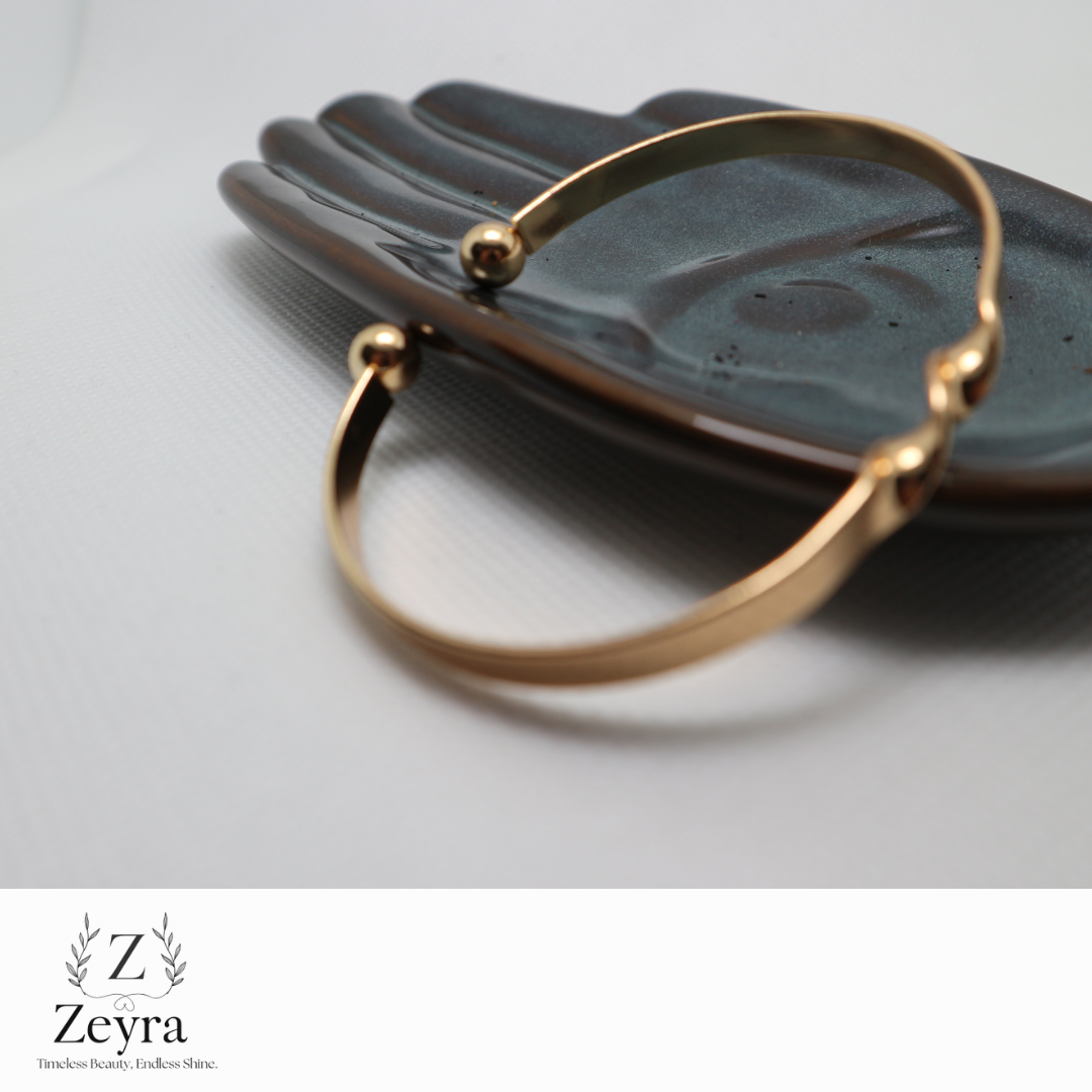 Zeyra Twiste – Moderner Armreif mit Twist-Design in Goldoptik | Zeyra | Versand aus DE